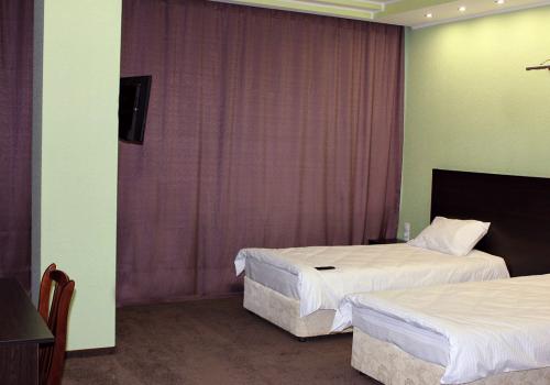 Номер стандарт улучшенный с 2 односпальными кроватями