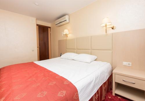 Номер люкс семейный с 1 двуспальной кроватью