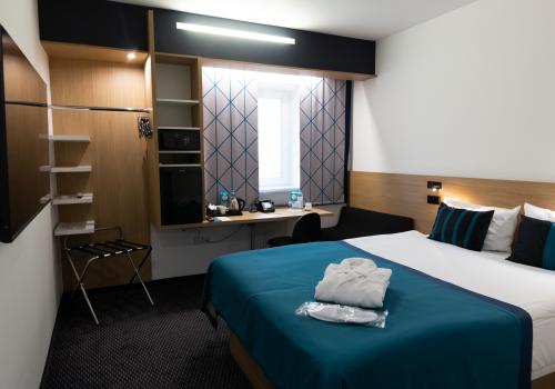 Номер комфорт улучшенный с 1 двуспальной кроватью