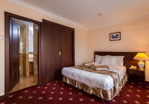 Номер стандарт с 1 двуспальной кроватью