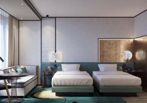 Номер стандарт с 2 односпальными кроватями и диваном