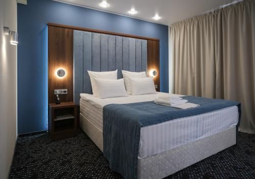 Номер люкс с 1 двуспальной кроватью