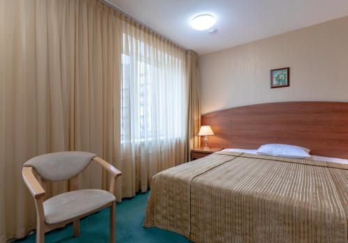 Номер стандарт с 1 двуспальной кроватью