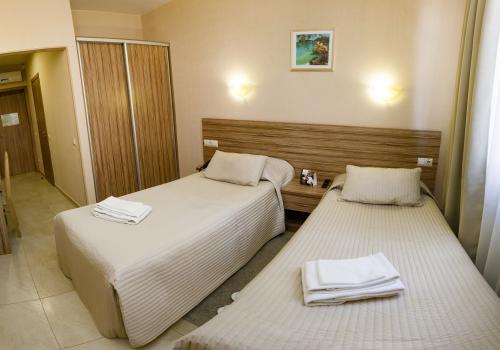 Номер стандарт бизнес с 2 односпальными кроватями