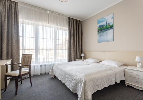 Номер стандарт улучшенный с 1 двуспальной кроватью