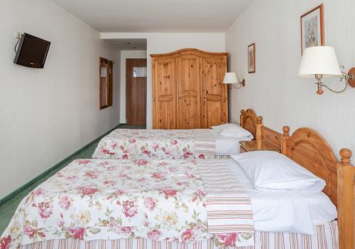 Номер стандарт с 2 односпальными кроватями (корпус Village)