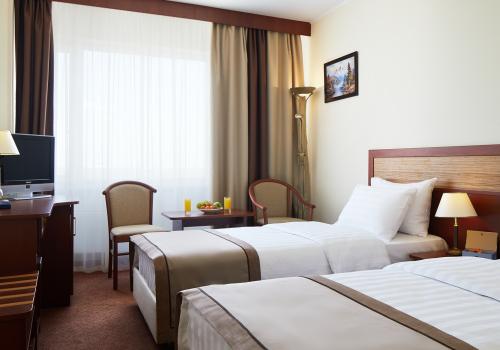 Номер стандарт бизнес с 2 односпальными кроватями