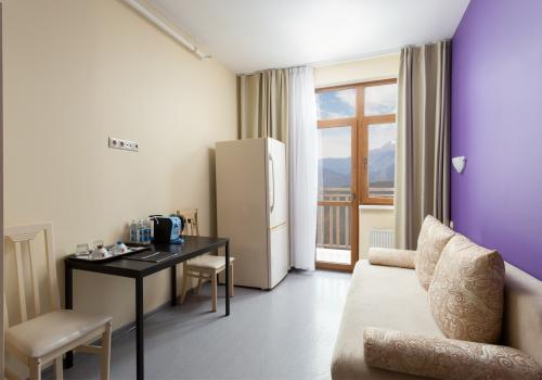 Фото Отель Riders Lodge