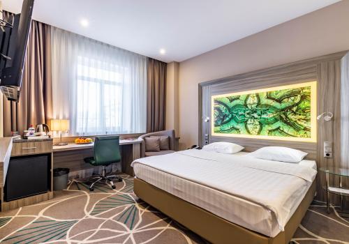 Номер стандарт с 1 двуспальной кроватью