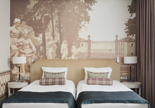 Номер улучшенный с 2 односпальными кроватями вид в Атриум