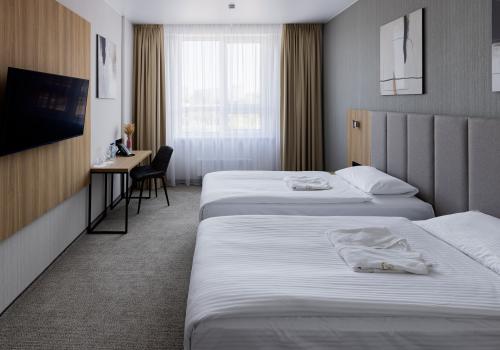 Номер улучшенный стандарт с 2 односпальными кроватями