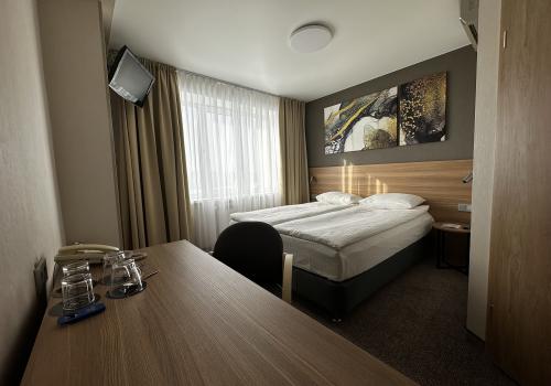 Номер улучшенный стандарт с 1 двуспальной кроватью