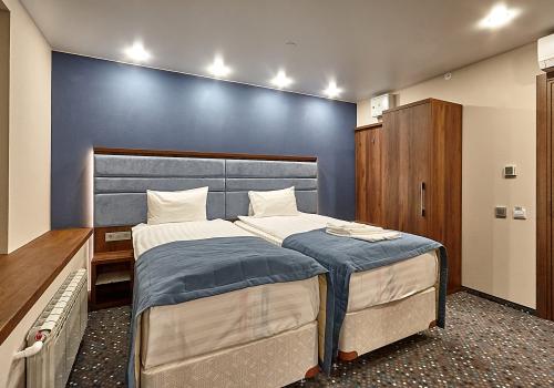 Номер стандарт улучшенный с 2 односпальными кроватями