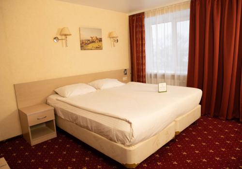 Номер стандарт бизнес с 1 двуспальной кроватью