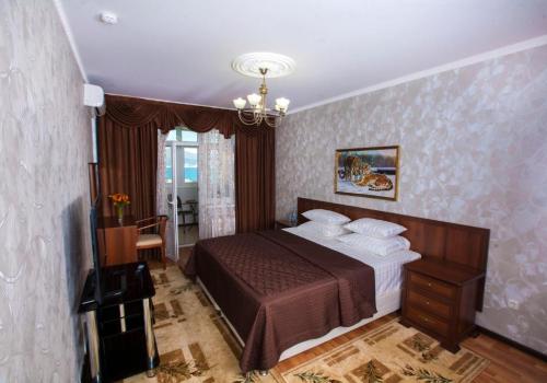 Номер стандарт с двуспальной кроватью и открытым балконом