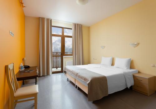 Фото Отель Riders Lodge