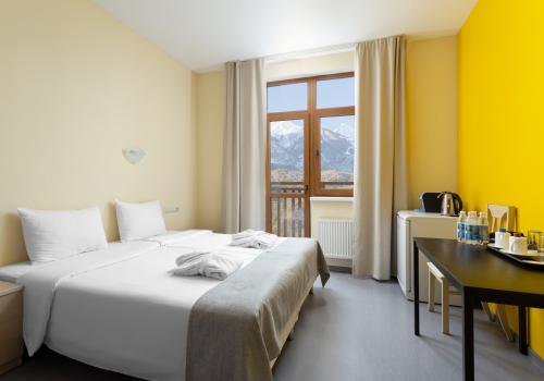 Фото Отель Riders Lodge