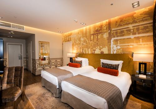 Номер улучшенный с 2 односпальными кроватями вид в Атриум