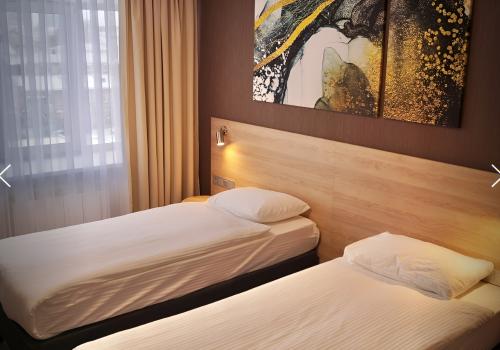 Номер улучшенный комфорт с 2 односпальными кроватями