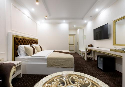 Номер делюкс с 1 двуспальной кроватью