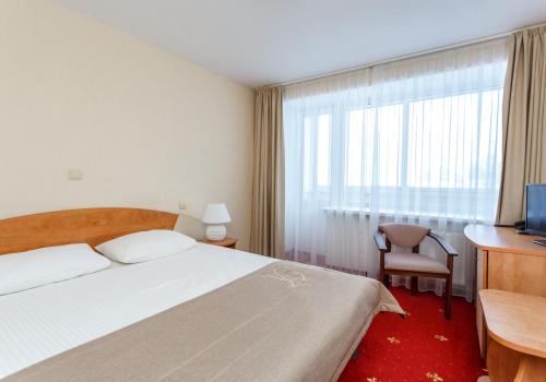 Номер стандарт с 1 двуспальной кроватью