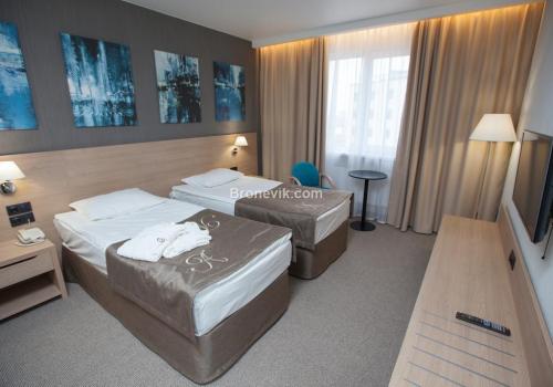 Номер стандарт бизнес с 2 односпальными кроватями