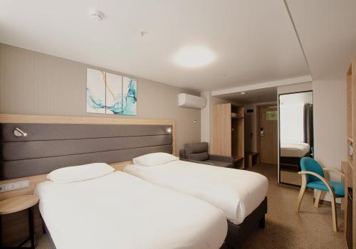 Номер полулюкс с 2 односпальными кроватями