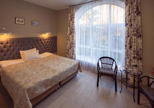 Номер стандарт с 1 двуспальной кроватью