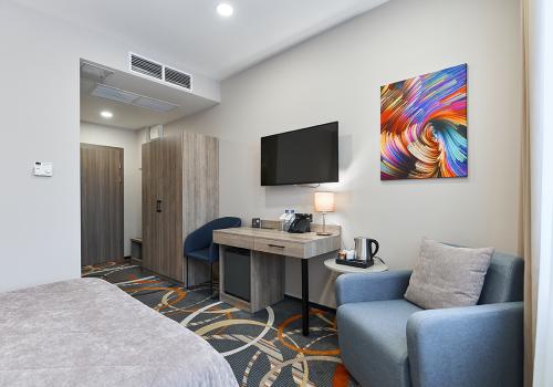 Номер стандарт с 1 двуспальной кроватью