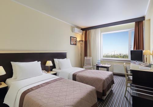 Номер стандарт бизнес с 2 односпальными кроватями