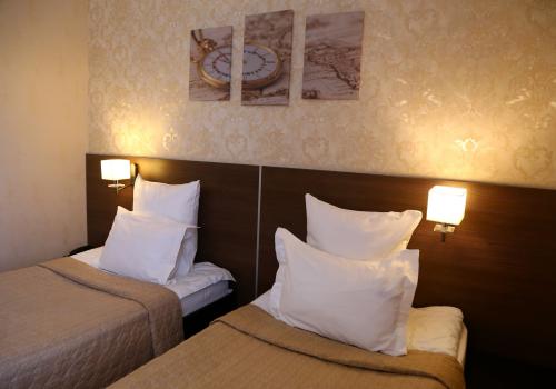 Номер стандарт улучшенный с 2 односпальными кроватями