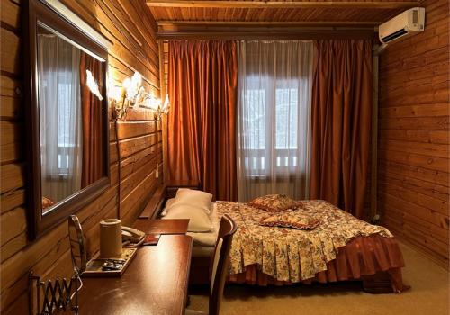 Фото Отель Русская Деревня