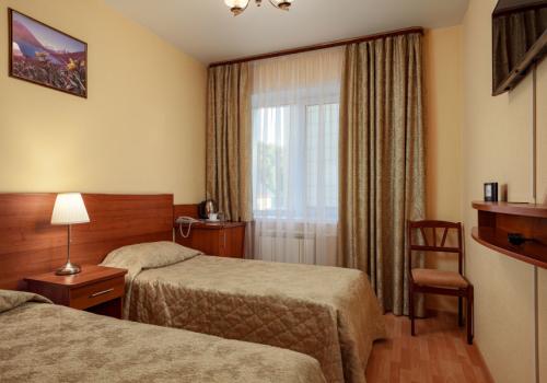 Номер стандарт с 2 односпальными кроватями (корпус 2)