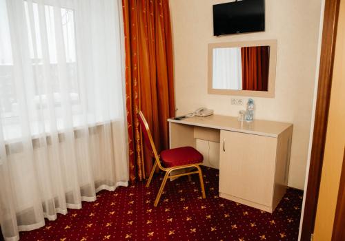 Номер стандарт бизнес с 1 двуспальной кроватью