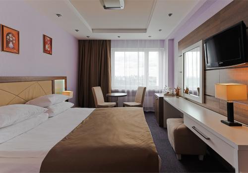 Номер стандарт с 1 двуспальной кроватью