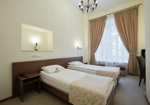 Номер стандарт бизнес с 2 односпальными кроватями