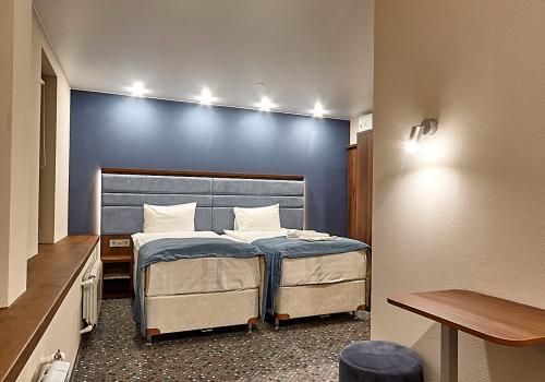 Номер стандарт улучшенный с 2 односпальными кроватями