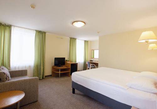 Номер стандарт с 1 двуспальной кроватью