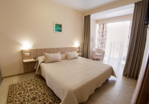 Номер люкс премиум с 1 двуспальной кроватью