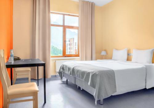 Фото Отель Riders Lodge