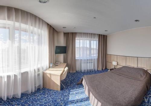 Номер стандарт премиум с 1 двуспальной кроватью