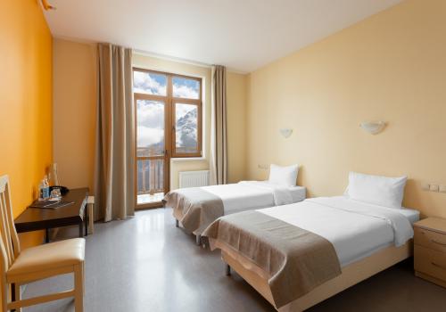 Фото Отель Riders Lodge