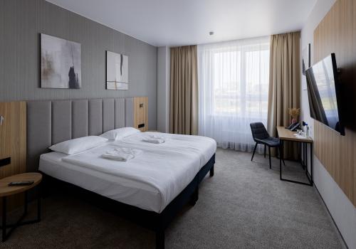 Номер улучшенный стандарт с 1 двуспальной кроватью