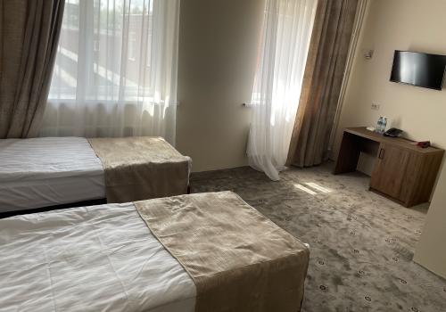 Номер стандарт улучшенный с 2 односпальными кроватями