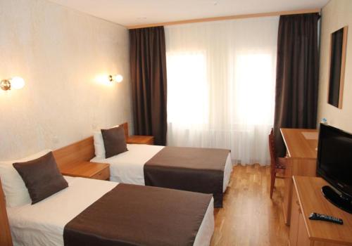 Номер стандарт с 2 односпальными кроватями