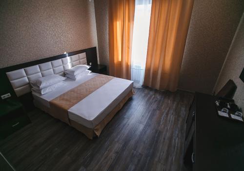 Комната стандарт с 1 двуспальной кроватью