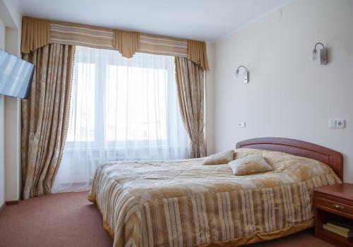 Номер люкс с 1 двуспальной кроватью