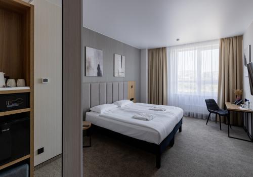 Номер улучшенный стандарт с 1 двуспальной кроватью