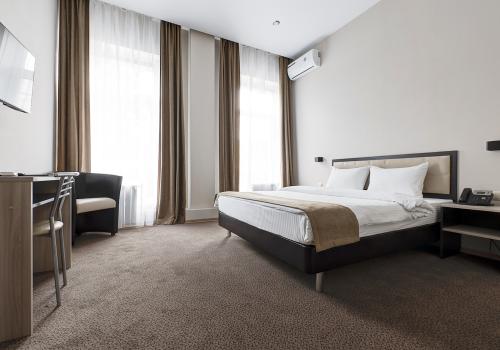 Номер стандарт с 1 двуспальной кроватью