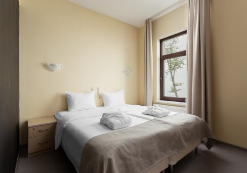 Фото Отель Riders Lodge